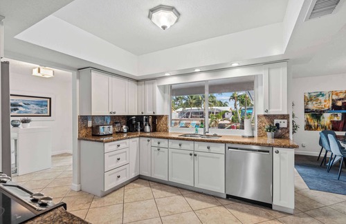 Coral Ridge Isles Villa | Coral Ridge Isles Beauty - Waterfront Pool Villa, BBQ