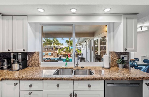 Coral Ridge Isles Villa | Coral Ridge Isles Beauty - Waterfront Pool Villa, BBQ