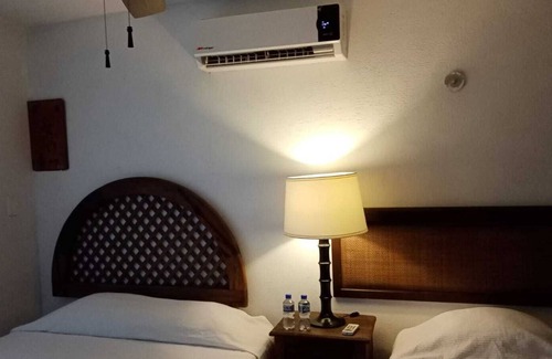 Puerto Juarez Hotel | Corazón de pescador