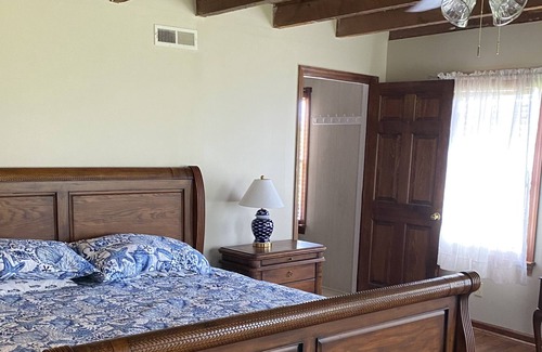 Stacy Cottage | Core Sound Waterfront Cottage with boat ramp and dock on the property.