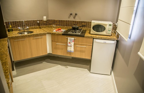Gonzaga Apartment | Cosmopolitan Praia Flat
