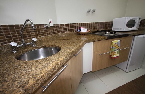 Gonzaga Apartment | Cosmopolitan Praia Flat