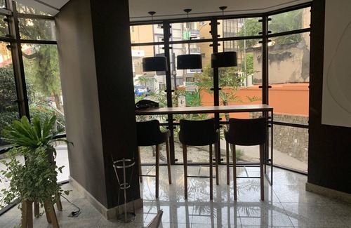 Gonzaga Apartment | Cosmopolitan Praia Flat