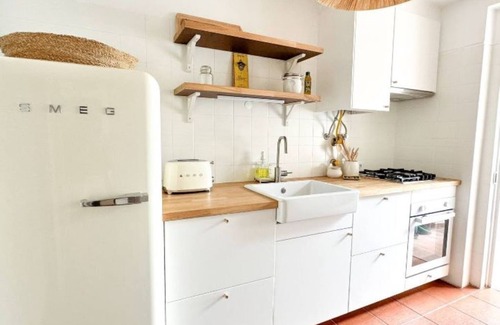 Costa de Caparica Villa | Costa INN | Cozy retreat with pool by the beach by Homeful