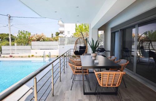 Voula Apartment | Costa Voula Poolside and Beach, Home Cinema