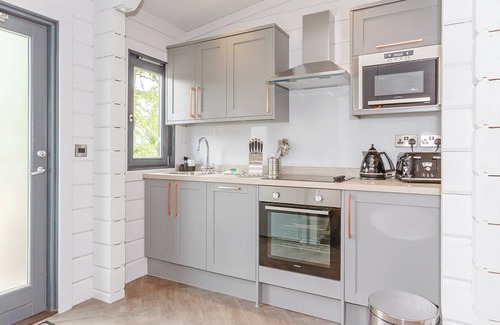 Aysgarth Ski Chalet | Cosy and contemporary semi-detached lodge with one double with en suite shower.