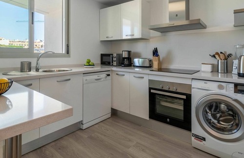 Carihuela Apartment | Cosy apartment for 4 people with pool, WIFI, A/C, TV, terrace and parking