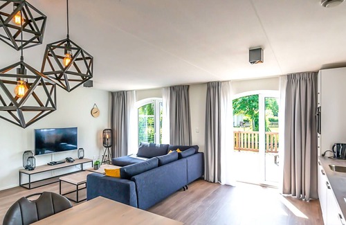 Municipality of Hellevoetsluis House | Cosy apartment in villa for 4 people with pool, WIFI, TV, terrace and parking