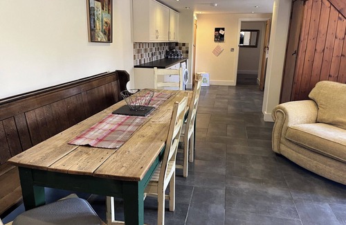 Corwen House | Cosy Barn - Sleeps 8, Hot Tub & Countryside Views