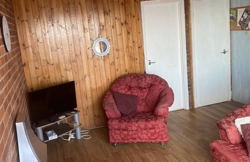 Amroth Ski Chalet | Cosy chalet with breathtaking sea views of the bay. Pet friendly.