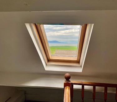 Maryport Apartment | Cosy Loft Apartment with Sea Views Above Village Pub The Stag Inn Crosby Maryport