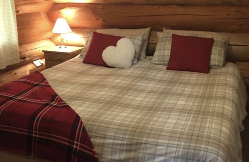 Knockin Cabin | Cosy Log Cabin in rural Shropshire overlooking fishing lakes