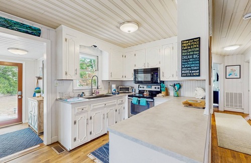Sunset Beach House | Cottage on intercoastal waterway with private pool, hot tub and large dock