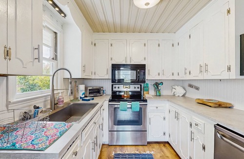 Sunset Beach House | Cottage on intercoastal waterway with private pool, hot tub and large dock