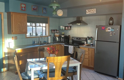 Flagstaff House | Cottage with a stone fire pit with fenced-in yard and No Pet Fees!