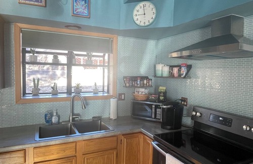 Flagstaff House | Cottage with a stone fire pit with fenced-in yard and No Pet Fees!
