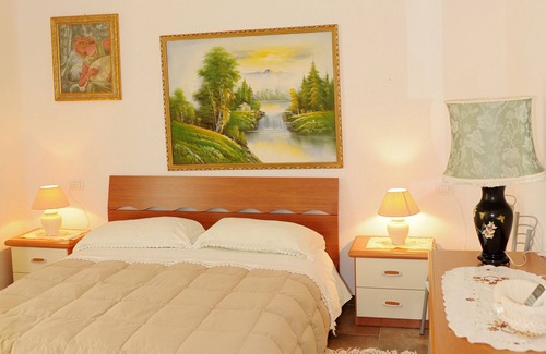 Baia Sant'Anna Apartment | Cottage with beautiful garden, in quiet area
