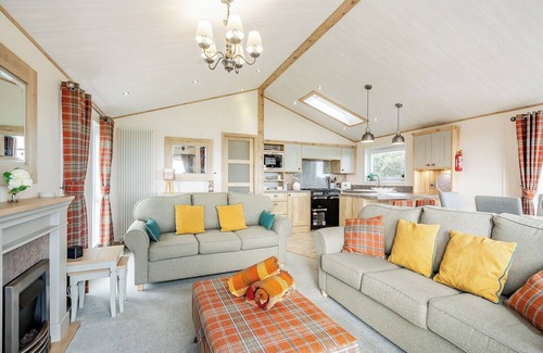 Kirkcudbright Ski Chalet | Country and modern cladded lodge with sea views.