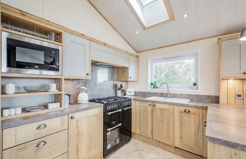 Kirkcudbright Ski Chalet | Country and modern cladded lodge with sea views.