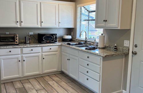 Redding House | Country oasis with shared swimming pool & hot tub, back yard/deck