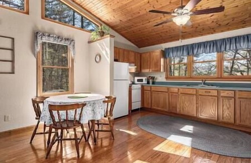 Hot Springs House | Couples Cabin with King bed and outdoor hot tub!