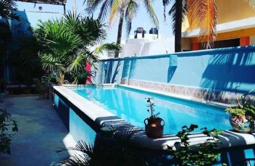 Puerto Yucalpeten Apartment | Courtyard family room