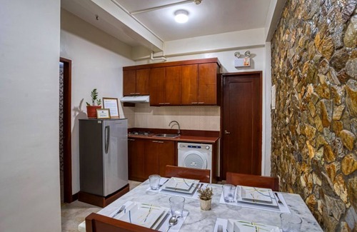 Estancia Apartment | Courtyard Haven: Klibo Escape