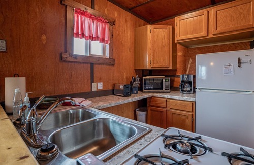 Cody Apartment | Cowboy Bunkhouse #2, clean rustic charm, located in South Fork Valley, 10 minutes from Downtown Cody
