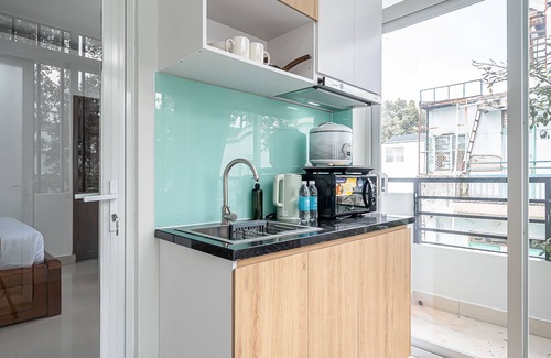 District 5 Apartment | Cozrum Homes - Retro House