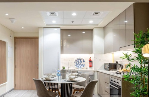 Nad Al Sheba Apartment | Cozy 1 Bed Apt in Azizi Riviera Dubai-Capital Stay