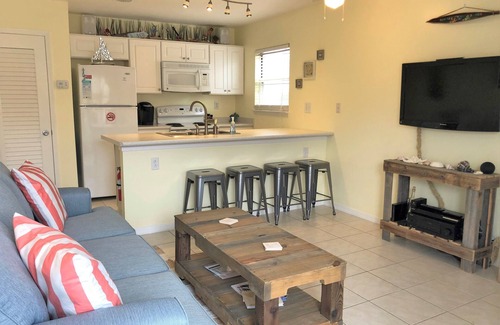 Navarre Beach House | Cozy 1 Bedroom Townhome with a pool and just steps from the beach.