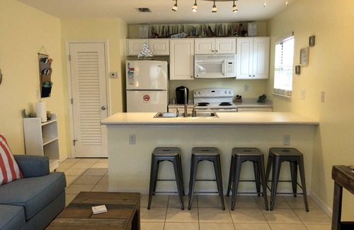 Navarre Beach House | Cozy 1 Bedroom Townhome with a pool and just steps from the beach.