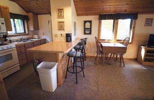 Munising Cottage | Cozy 2 bedroom cottage with full kitchen minutes from Pictured Rocks Cruises!