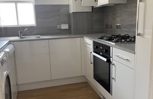 Newham Apartment | Cozy 2-BR Home with Patio & Parking in London! 10 Mins to London City Airport