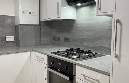 Newham Apartment | Cozy 2-BR Home with Patio & Parking in London! 10 Mins to London City Airport