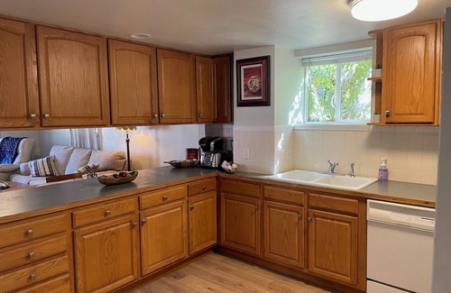 Greeley House | Cozy 3-bedroom garden level, dog friendly, in the heart of Greeley