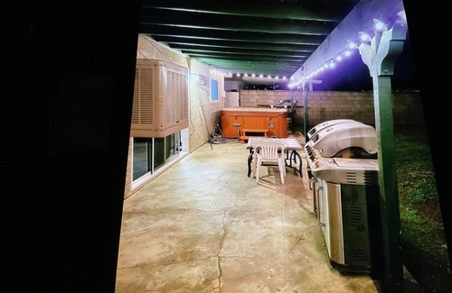 Lancaster House | Cozy 4-bedroom house has WiFi and AC in superb Lancaster, a game room & hot tub.