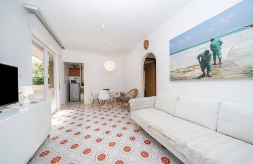 Grado Pineta Apartment | Cozy 56 sqm ground-floor apartment featuring a balcony running along the entire perimeter and a private garden, perfect for relaxation and tranquility. Located in Grado Pineta, a green and quiet area just steps from the sea and nature trails, it offers t