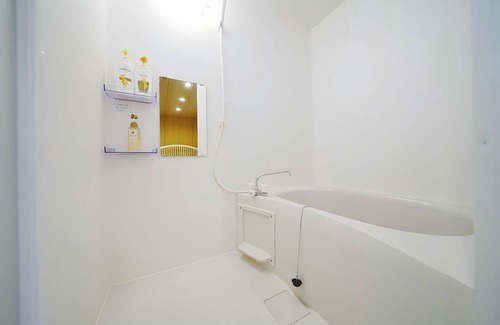 Sonezakishinchi Apartment | Cozy 6 - guest Japanese - themed stay. Great facilities. Private & comfy.
