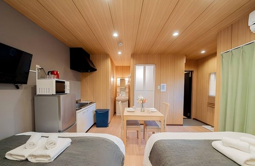 Sonezakishinchi Apartment | Cozy 6 - guest Japanese - themed stay. Great facilities. Private & comfy.