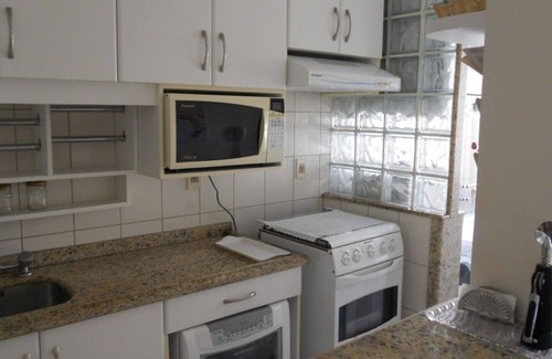 Jurere Internacional Apartment | Cozy apartment on Florianópolis' most famous beach.