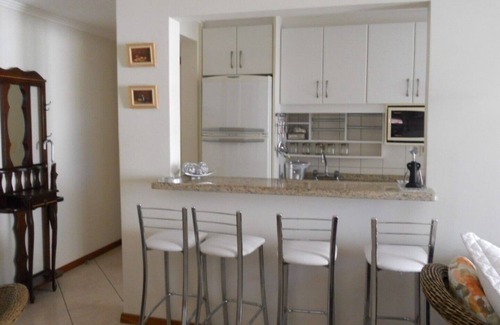 Jurere Internacional Apartment | Cozy apartment on Florianópolis' most famous beach.