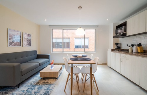 Financial District Apartment | Cozy Apartment in Zona G with Laundry Facilities