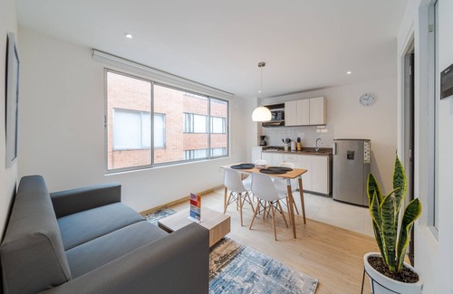 Financial District Apartment | Cozy Apartment in Zona G with Laundry Facilities