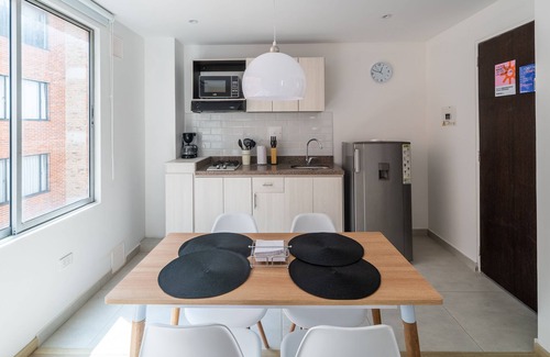 Financial District Apartment | Cozy Apartment in Zona G with Laundry Facilities