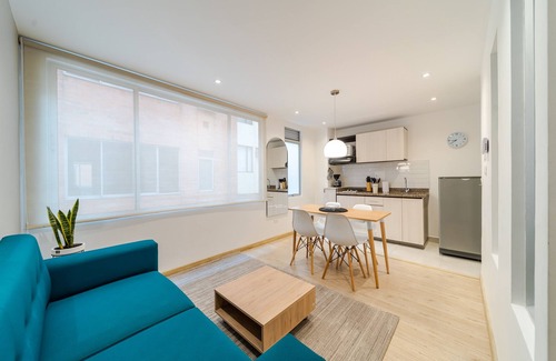 Financial District Apartment | Cozy Apartment in Zona G with Laundry Facilities