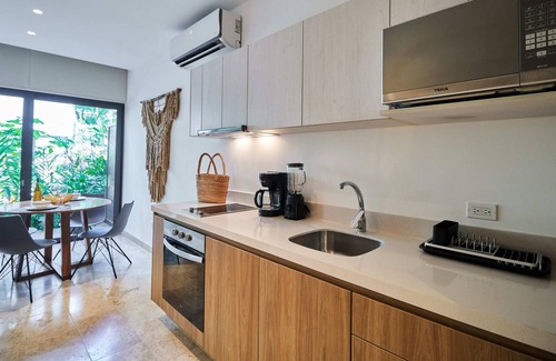 Tohoku Apartment | Cozy Apartment in Playa del Carmen | Game Room, Gym & Rooftop Pool | Great Amenities