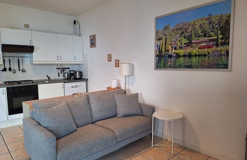 Sala Comacina Apartment | Cozy apartment with swimming pool, just a short walk from the lakeside.