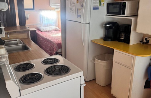 Surfside Beach Cottage | Cozy beach cottage. Short walk to the beach! Family friendly.