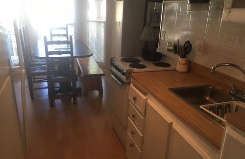 Surfside Beach Cottage | Cozy beach cottage. Short walk to the beach! Family friendly.